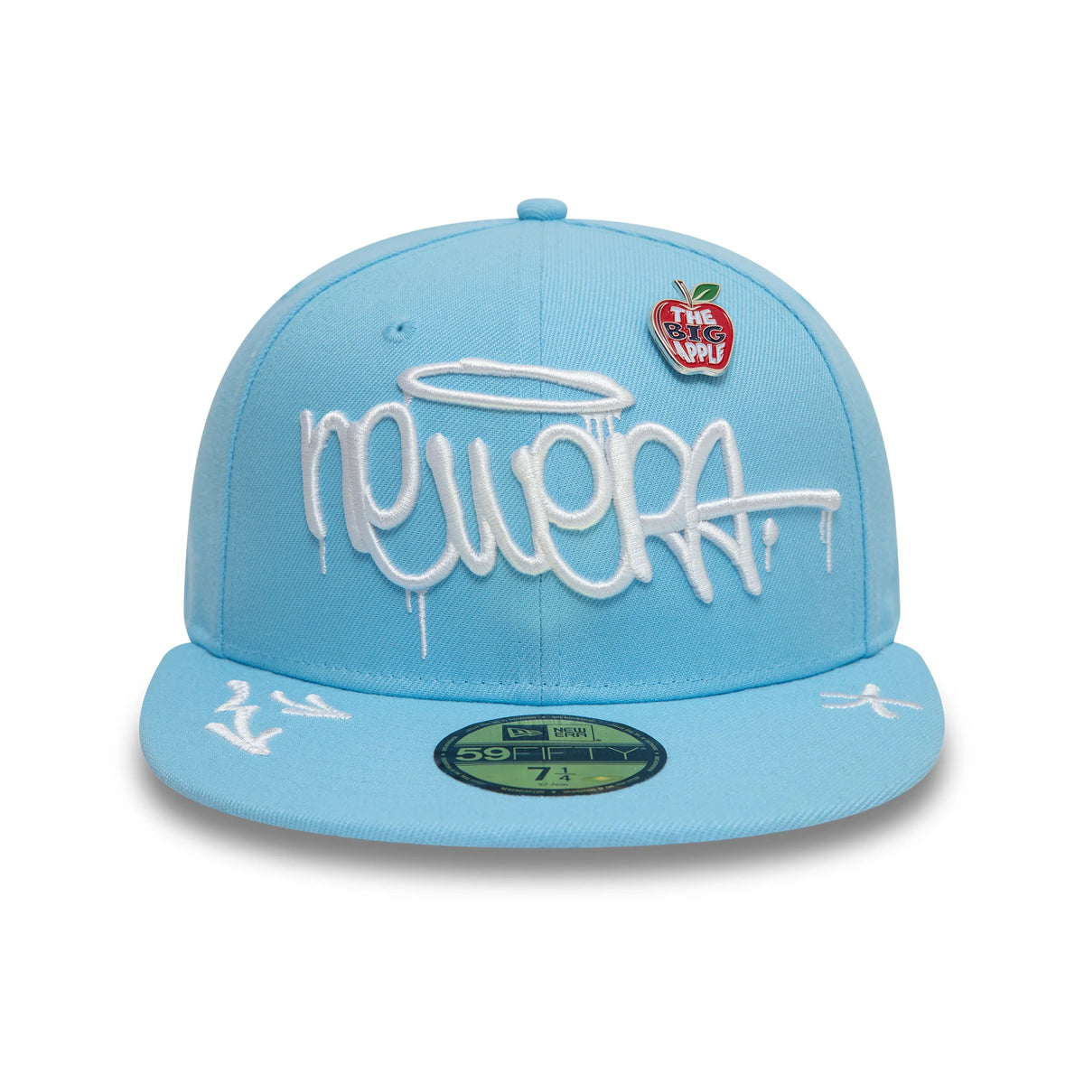 New Era Graphic Pastel Blue New Era 59FIFTY Fitted Cap, front view showing white graffiti-style logo embroidery with a halo, a Big Apple pin on the right front panel, and a gold 59FIFTY size sticker on the visor.