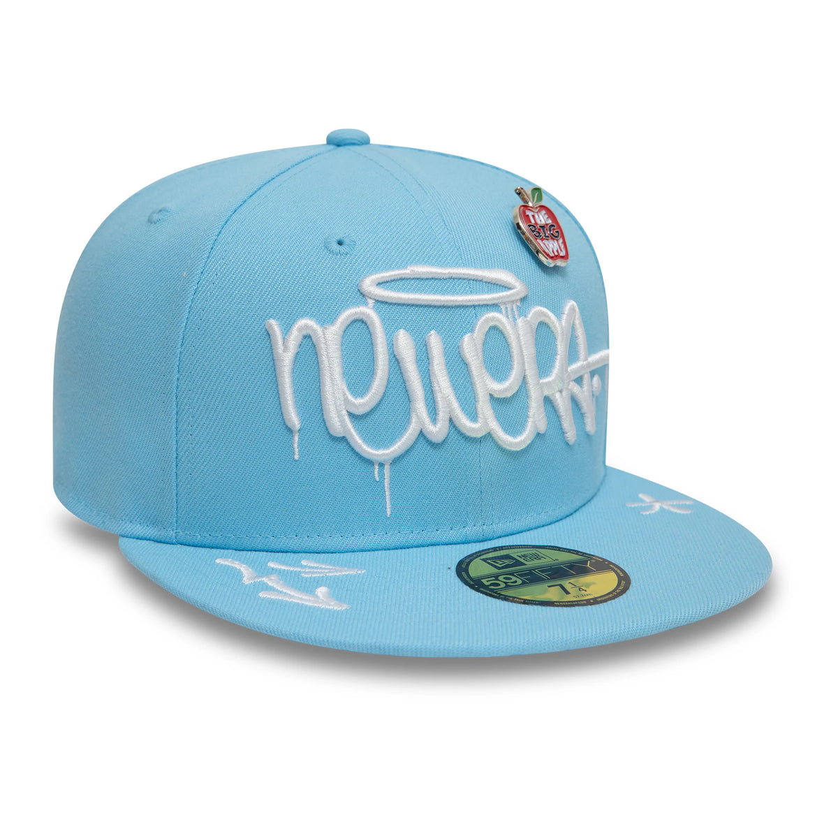New Era Graphic Pastel Blue New Era 59FIFTY Fitted Cap, front view showing a white embroidered graffiti-style logo with a halo on the front panel, featuring an apple pin at the top, with a gold 59FIFTY size sticker on the visor.