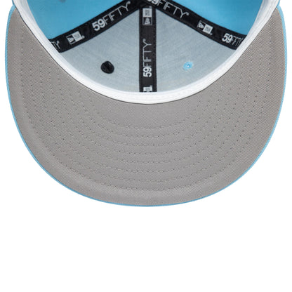 New Era Graphic Pastel Blue New Era 59FIFTY Fitted Cap, inside view showing grey undervisor, black taping with 59FIFTY branding, and a light blue sweatband beneath the structured crown.