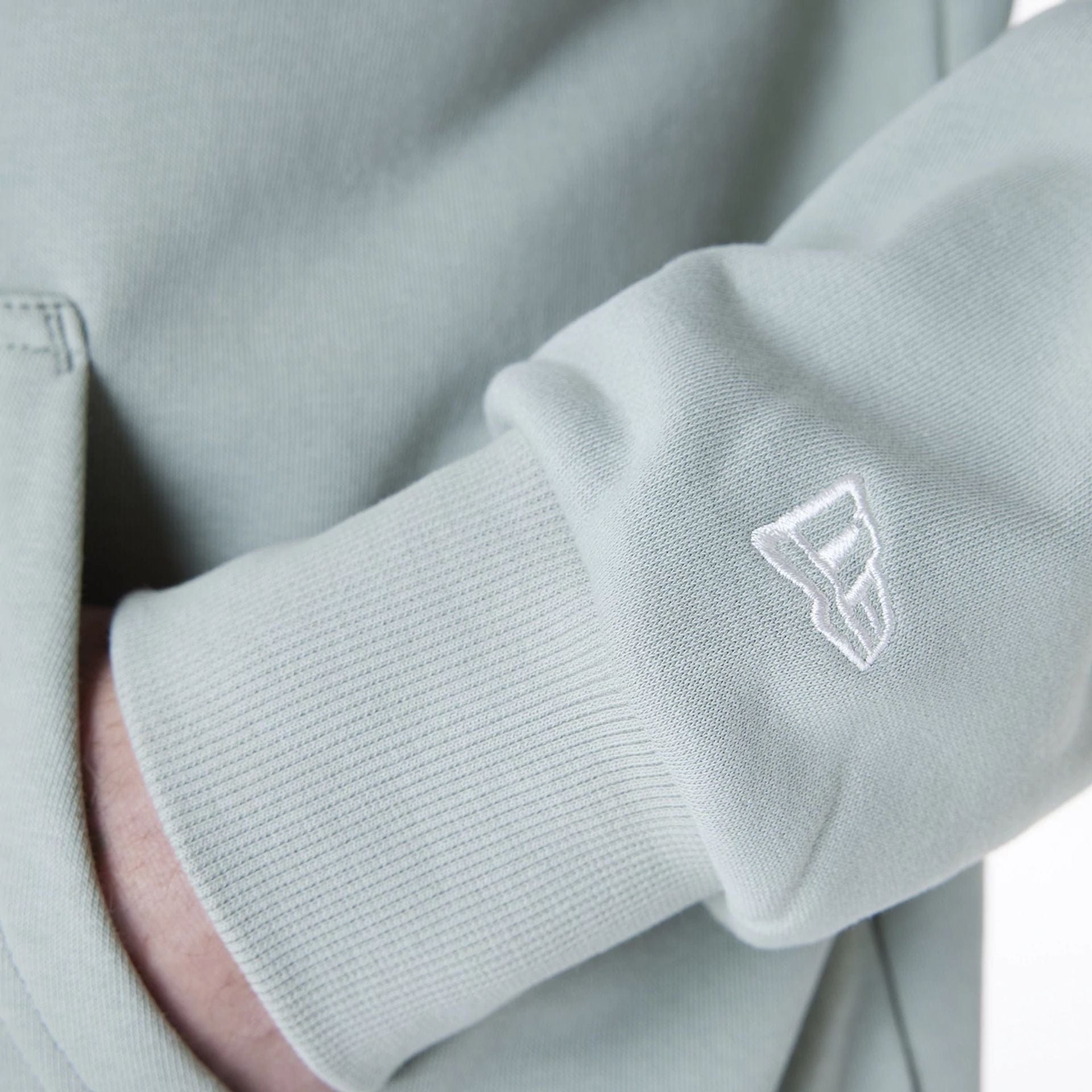 The Male model is wearing New York Yankees MLB League Essential Pastel Green Oversized Pullover Hoodie 5