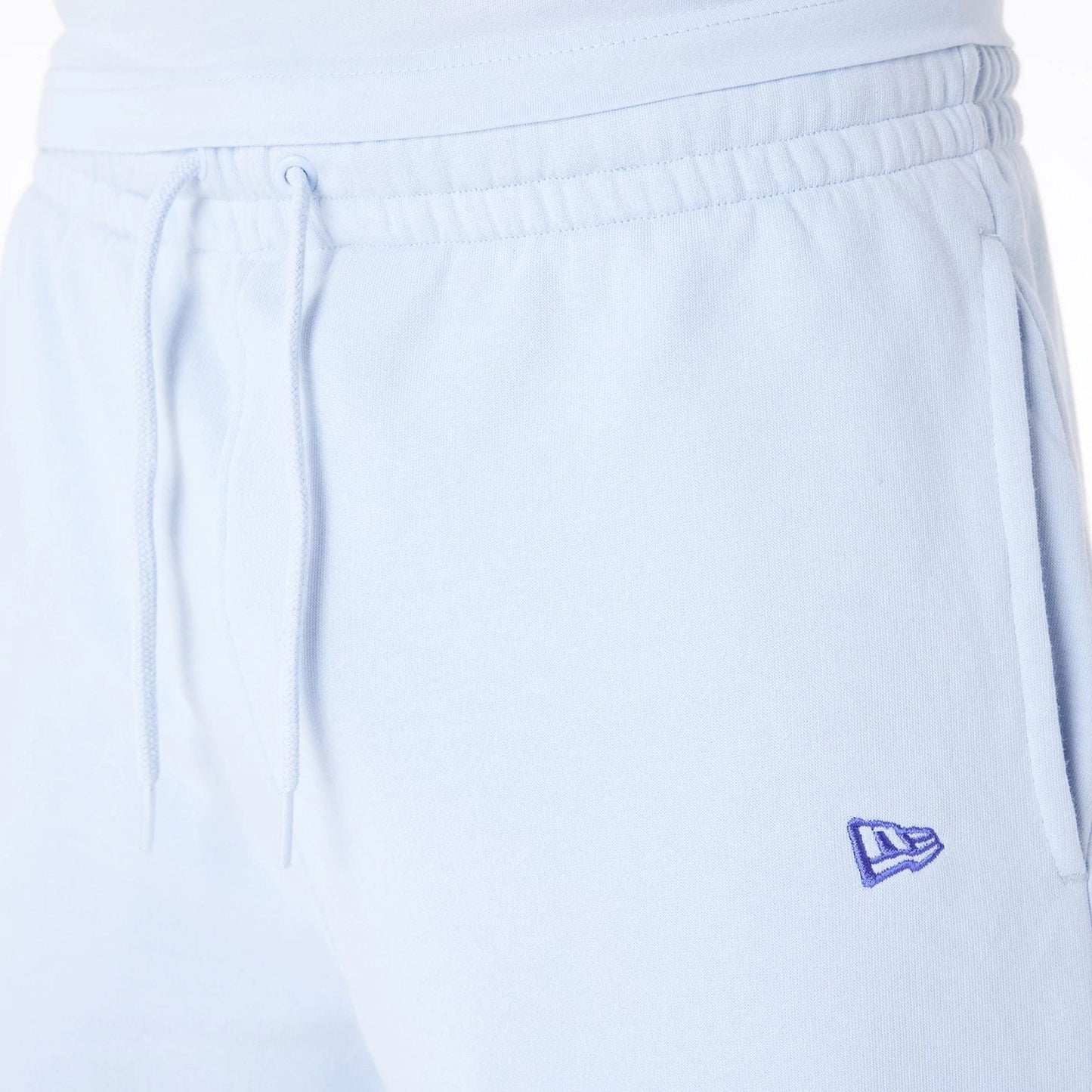 The Male model is wearing Detroit Tigers MLB League Essential Pastel Blue Shorts 4