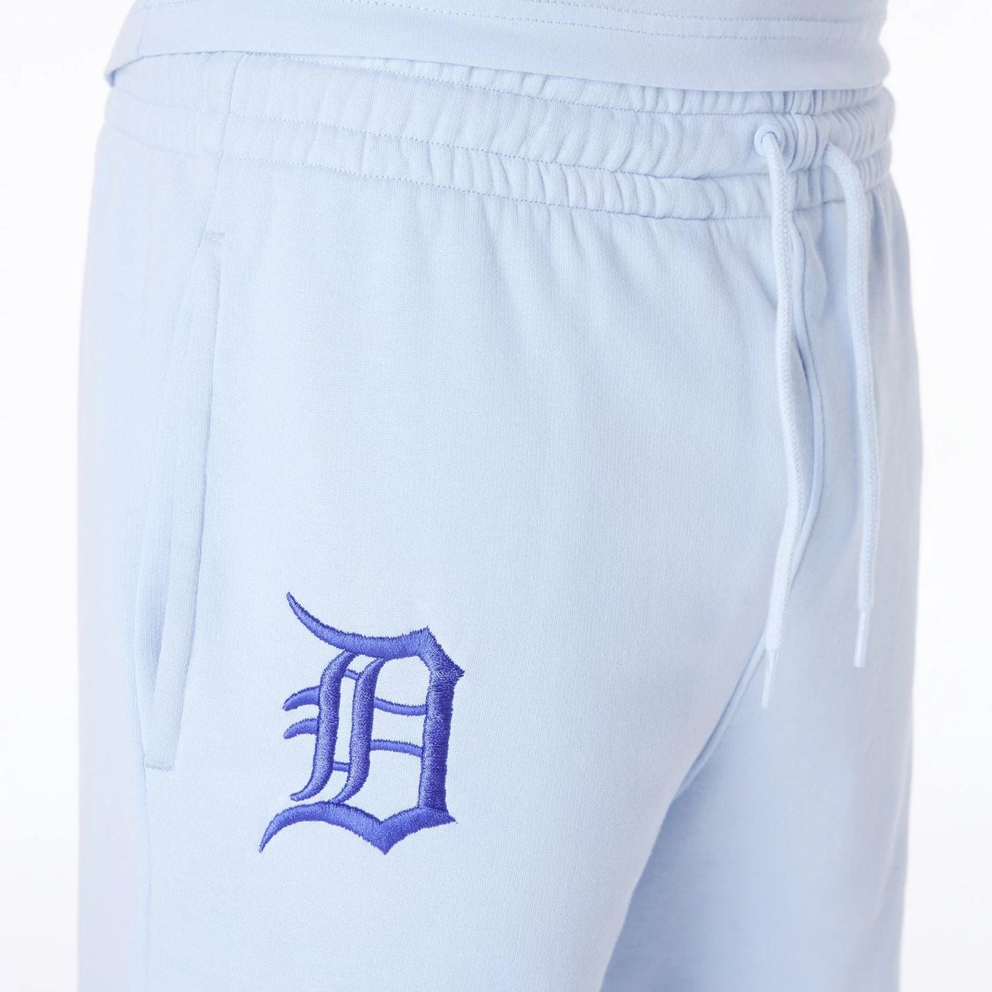 The Male model is wearing Detroit Tigers MLB League Essential Pastel Blue Shorts 6