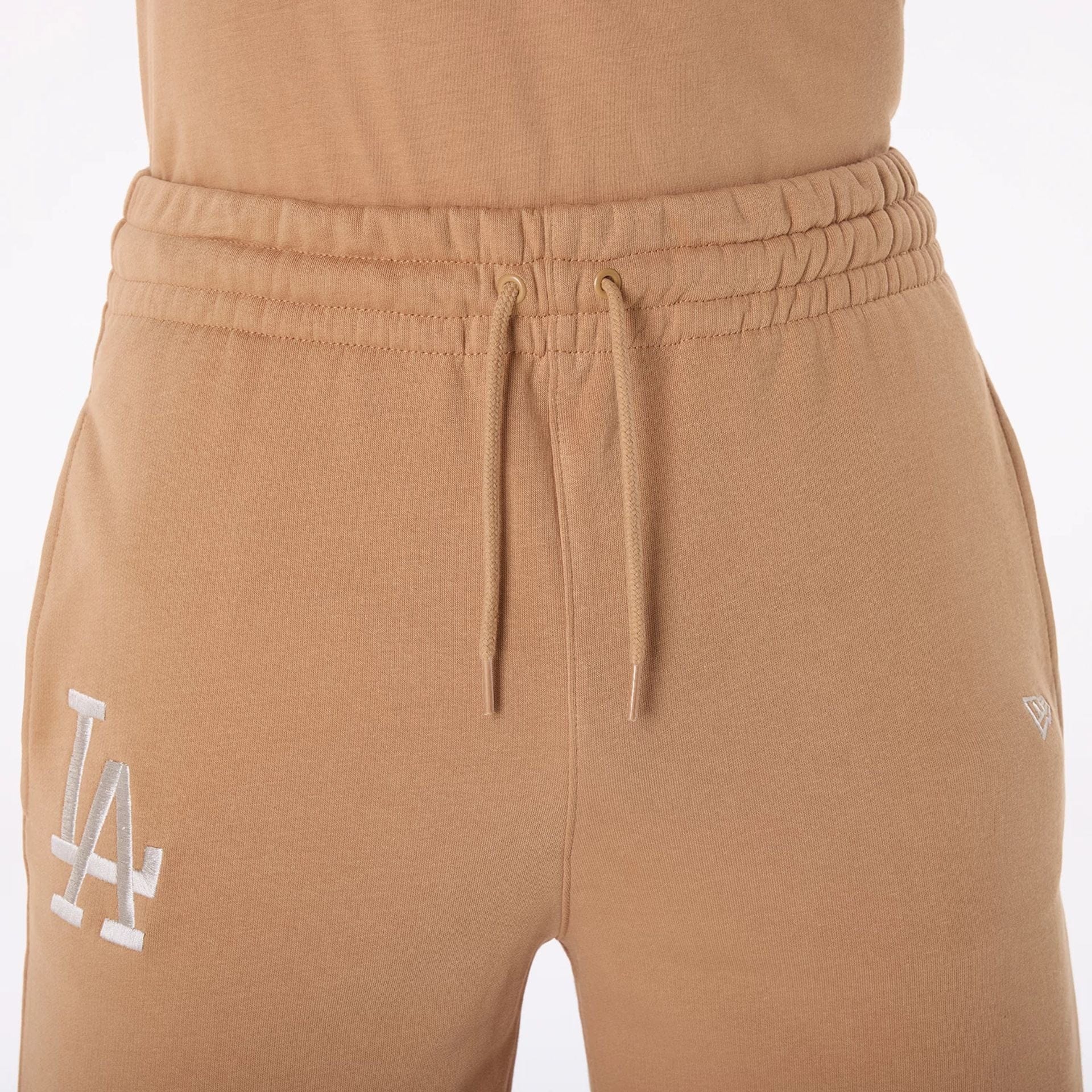 The Male model is wearing LA Dodgers MLB League Essential Dark Beige Shorts 6