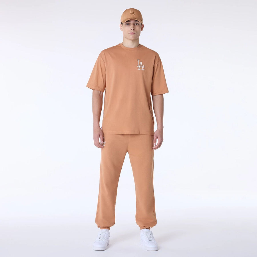 The Male model is wearing LA Dodgers MLB League Essential Dark Beige Oversized T-Shirt 8