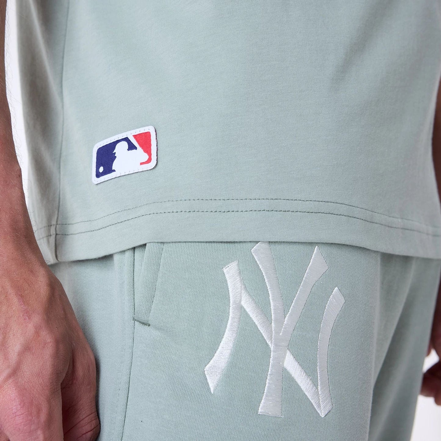 The Male model is wearing New York Yankees MLB League Essential Pastel Green Oversized T-Shirt 5