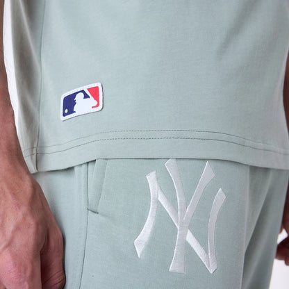 The Male model is wearing New York Yankees MLB League Essential Pastel Green Oversized T-Shirt 5