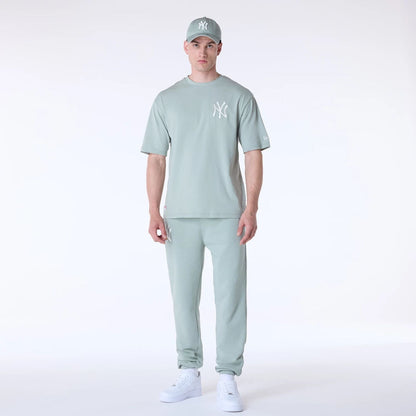 The Male model is wearing New York Yankees MLB League Essential Pastel Green Oversized T-Shirt 8