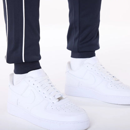 The Male model is wearing New York Yankees MLB Track Pants Navy Fleece Joggers 3