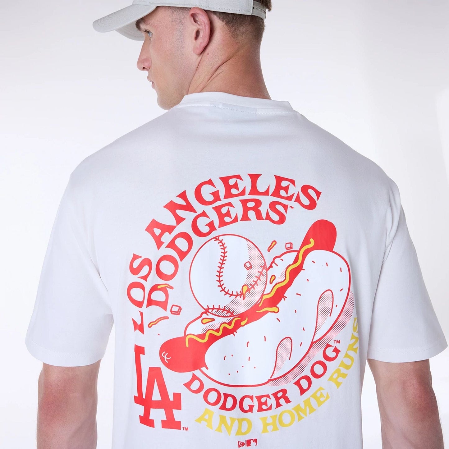 The Male model is wearing LA Dodgers MLB Food Graphic Open White Oversized T-Shirt 4