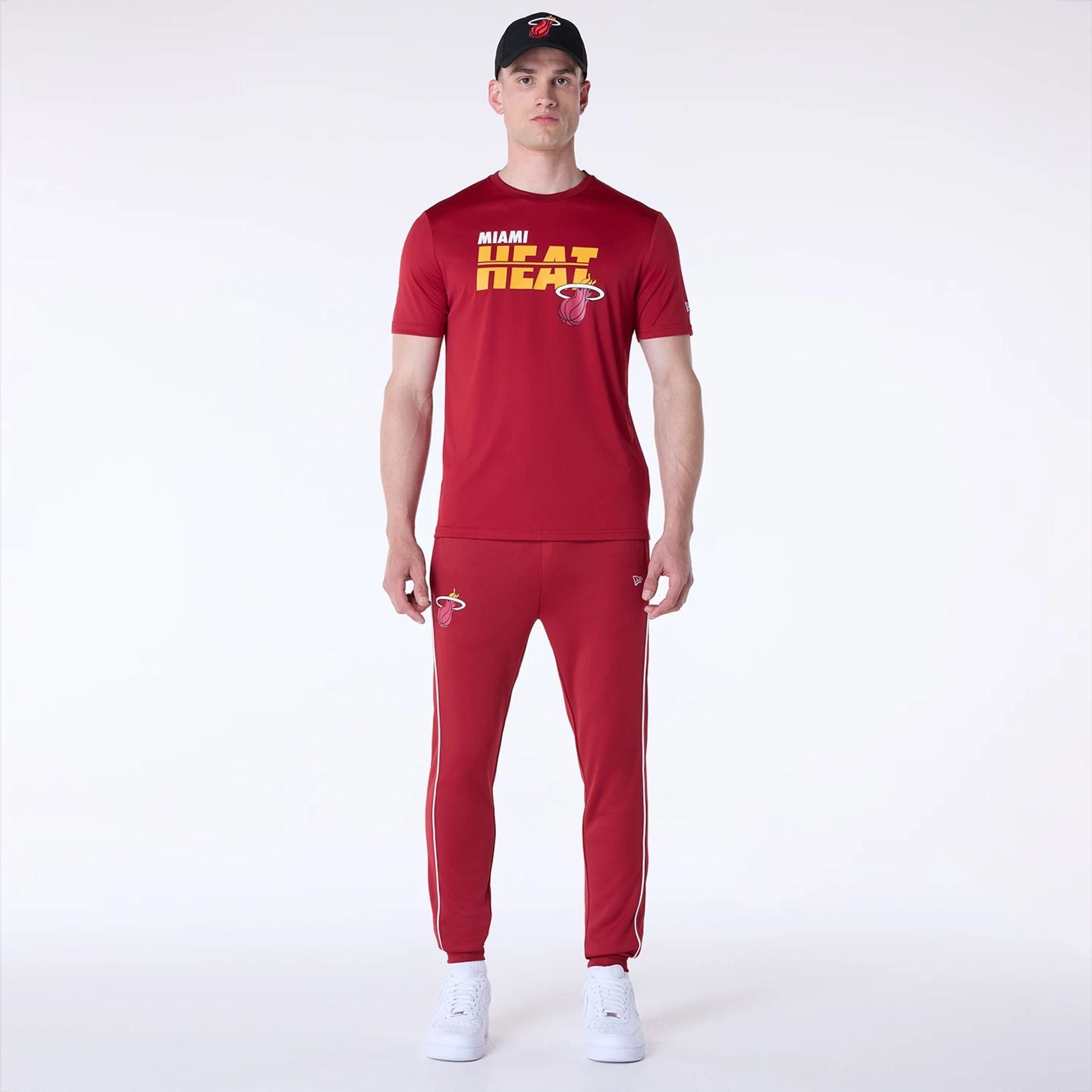 The Male model is wearing Miami Heat NBA Essentials Dark Red T-Shirt 8