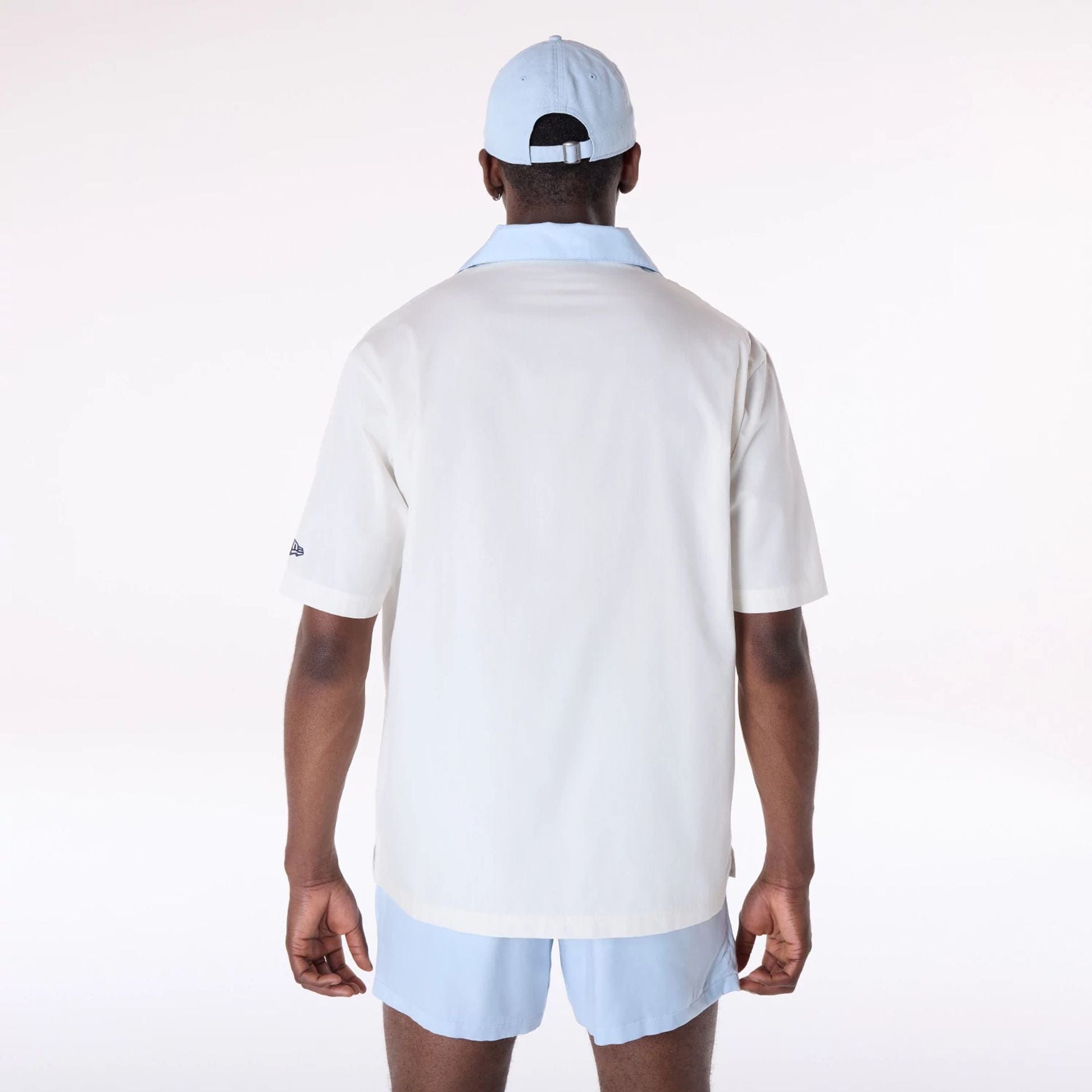 The Male model is wearing LA Dodgers Stripe Revere Open White Short Sleeve Shirt 2