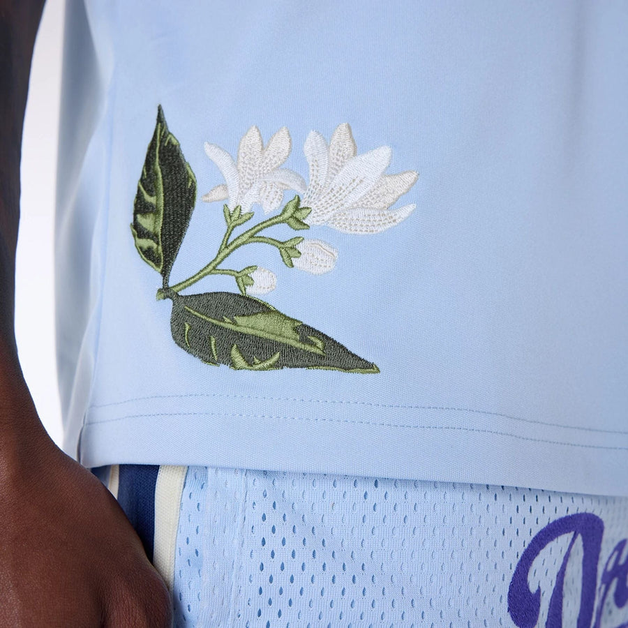 The Male model is wearing LA Dodgers MLB Floral Pastel Blue Oversized T-Shirt 3