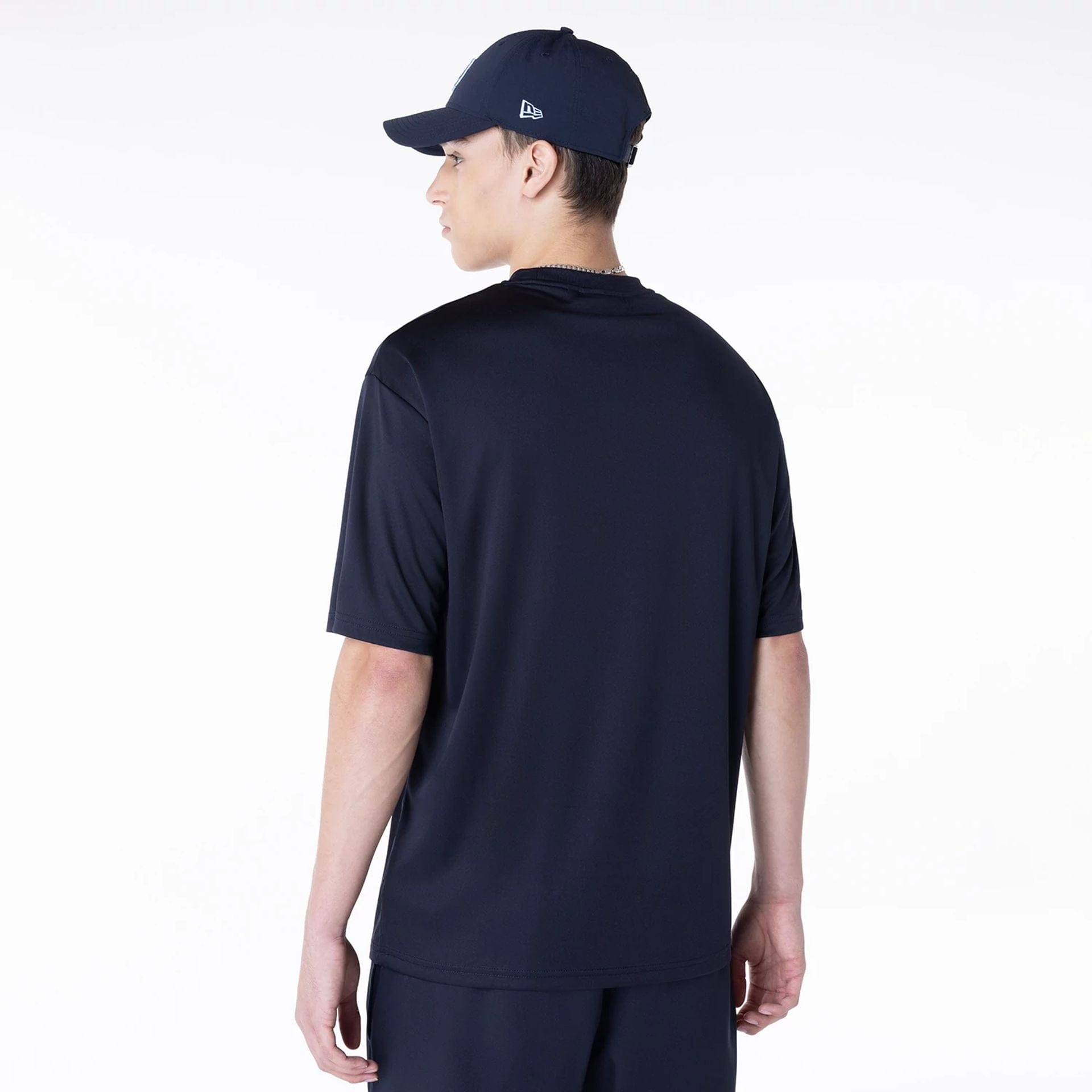 The Male model is wearing LA Dodgers League Essential Navy T-Shirt 2