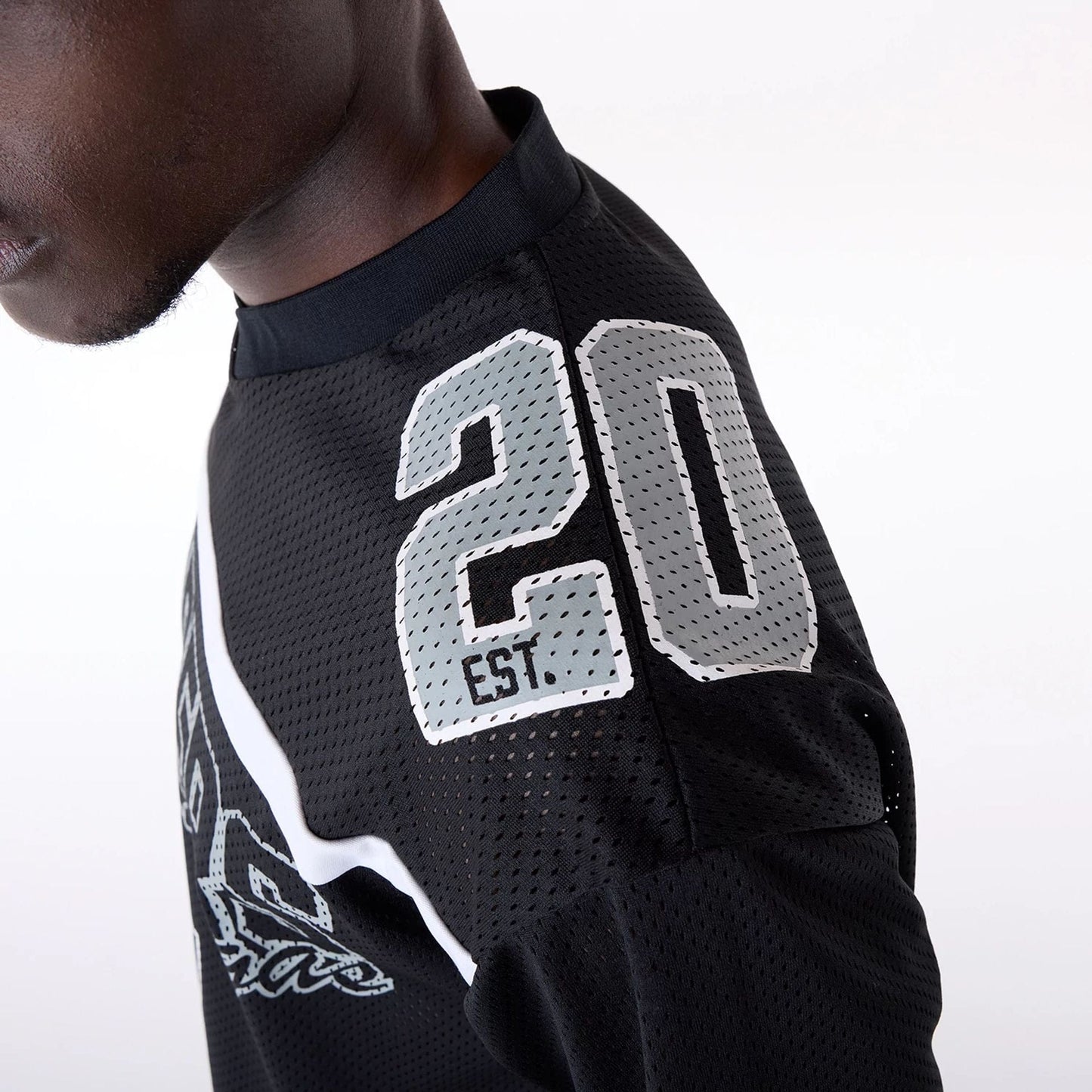 The Male model is wearing Las Vegas Raiders NFL Mesh Black T-Shirt 5
