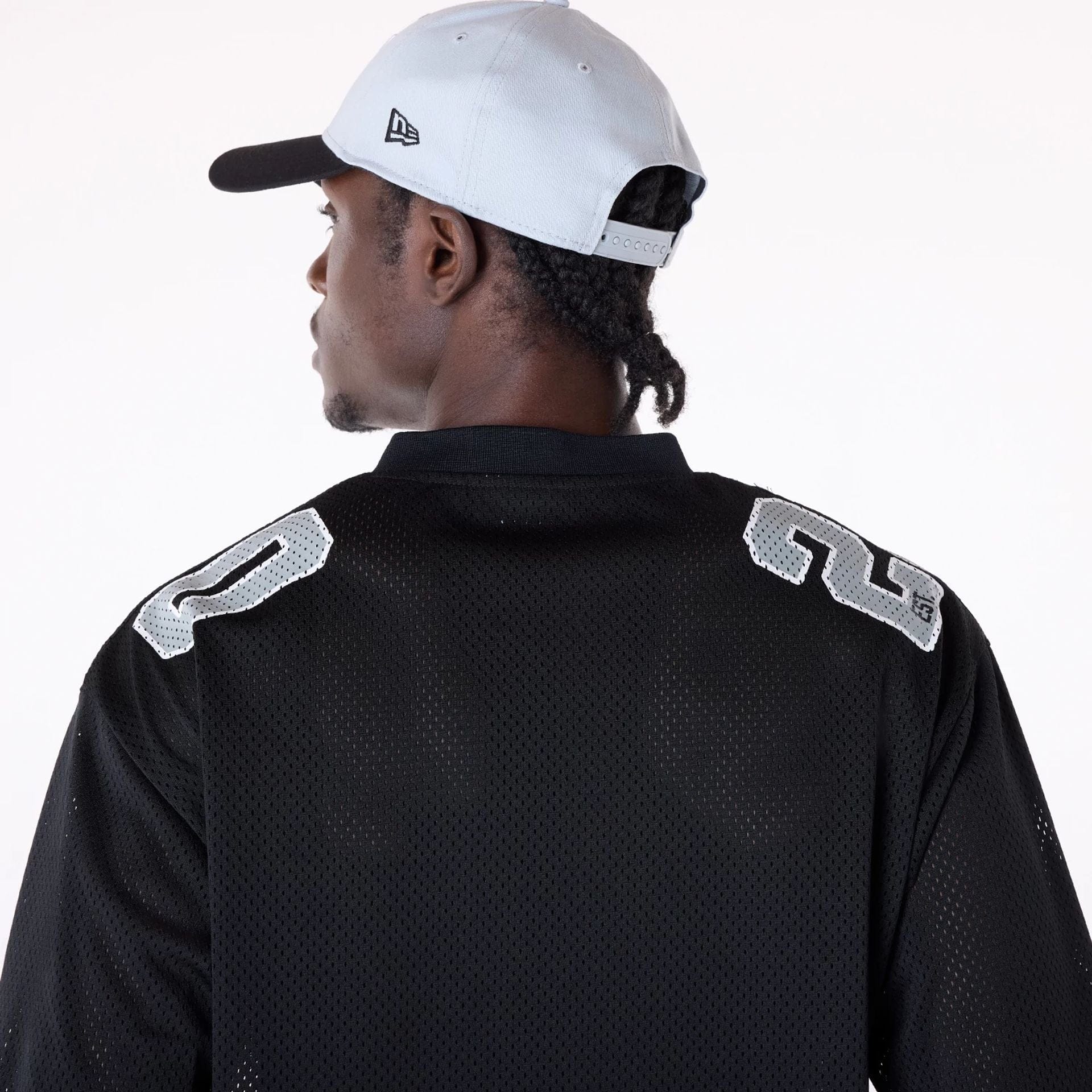 The Male model is wearing Las Vegas Raiders NFL Mesh Black T-Shirt 4