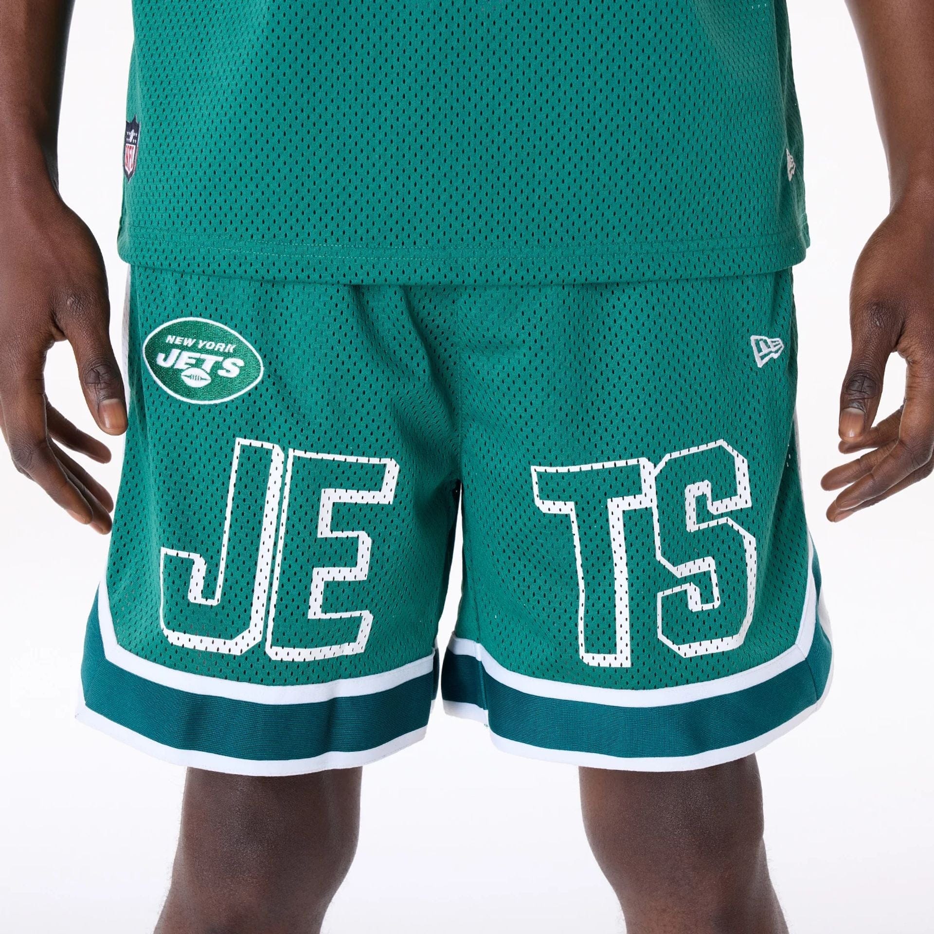 The Male model is wearing New York Jets NFL Mesh Green Shorts 8