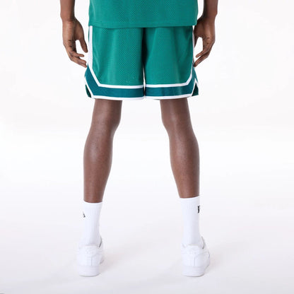 The Male model is wearing New York Jets NFL Mesh Green Shorts 3
