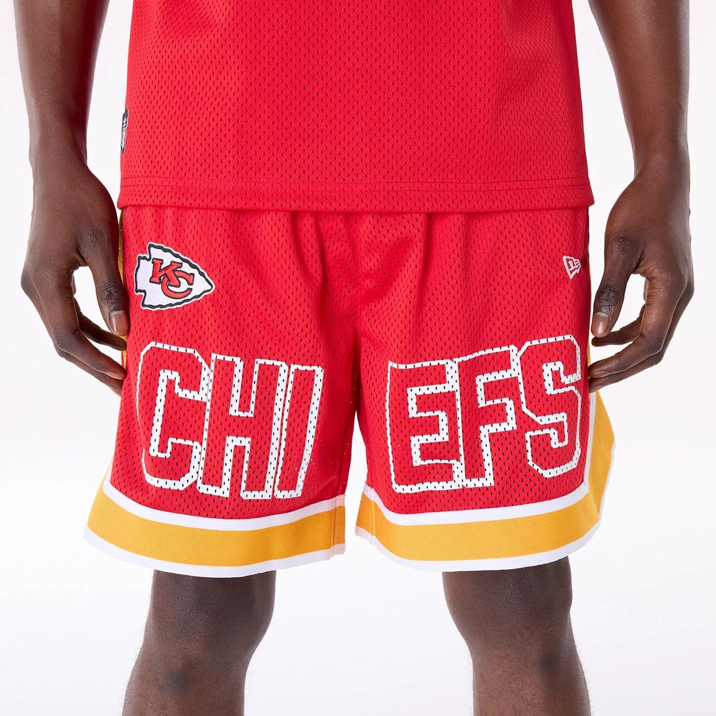 The Male model is wearing Kansas City Chiefs NFL Mesh Red Shorts 7