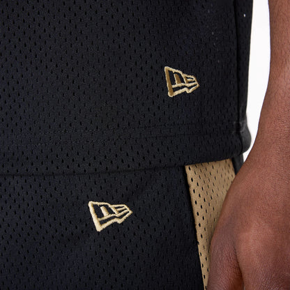 The Male model is wearing San Francisco 49ers NFL Mesh Black Shorts 5