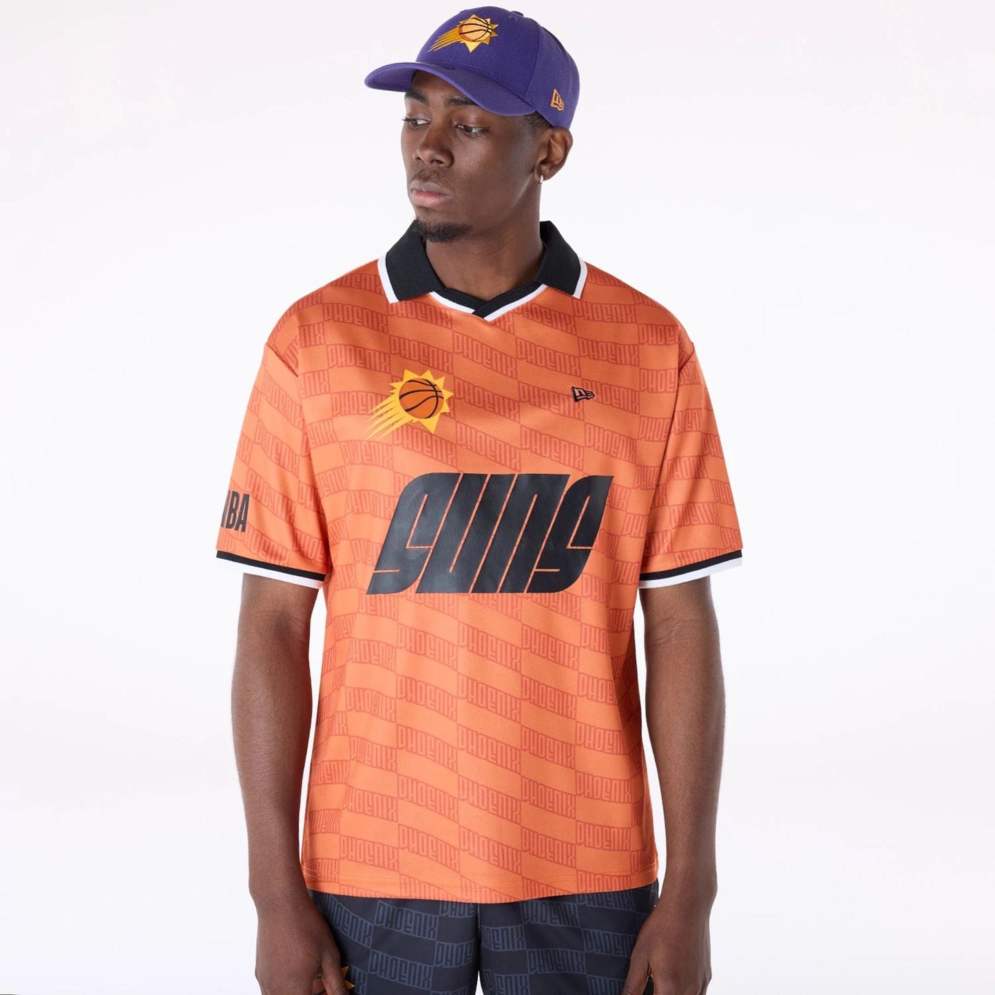 The Male model is wearing Phoenix Suns NBA Soccer Med Orange Oversized T-Shirt 1