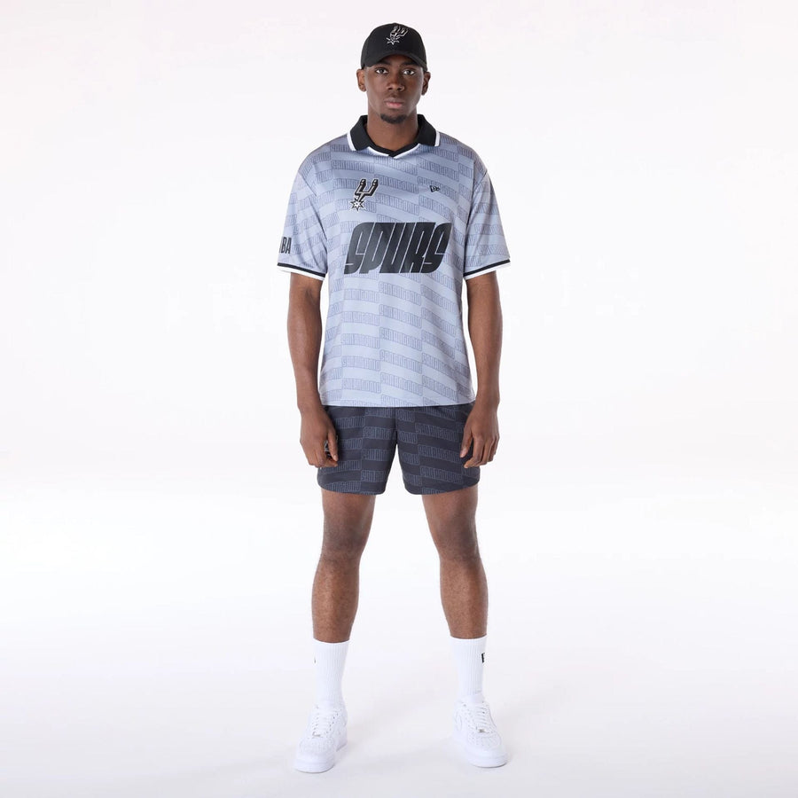 The Male model is wearing San Antonio Spurs NBA All Over Print Graphic Black Shorts 4