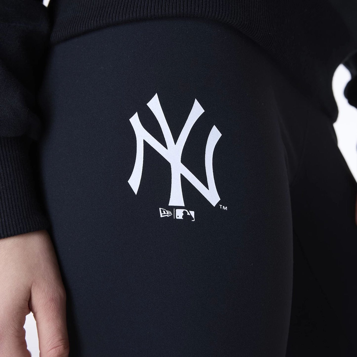 The Female model is wearing New York Yankees Womens MLB League Essential Black Leggings 6