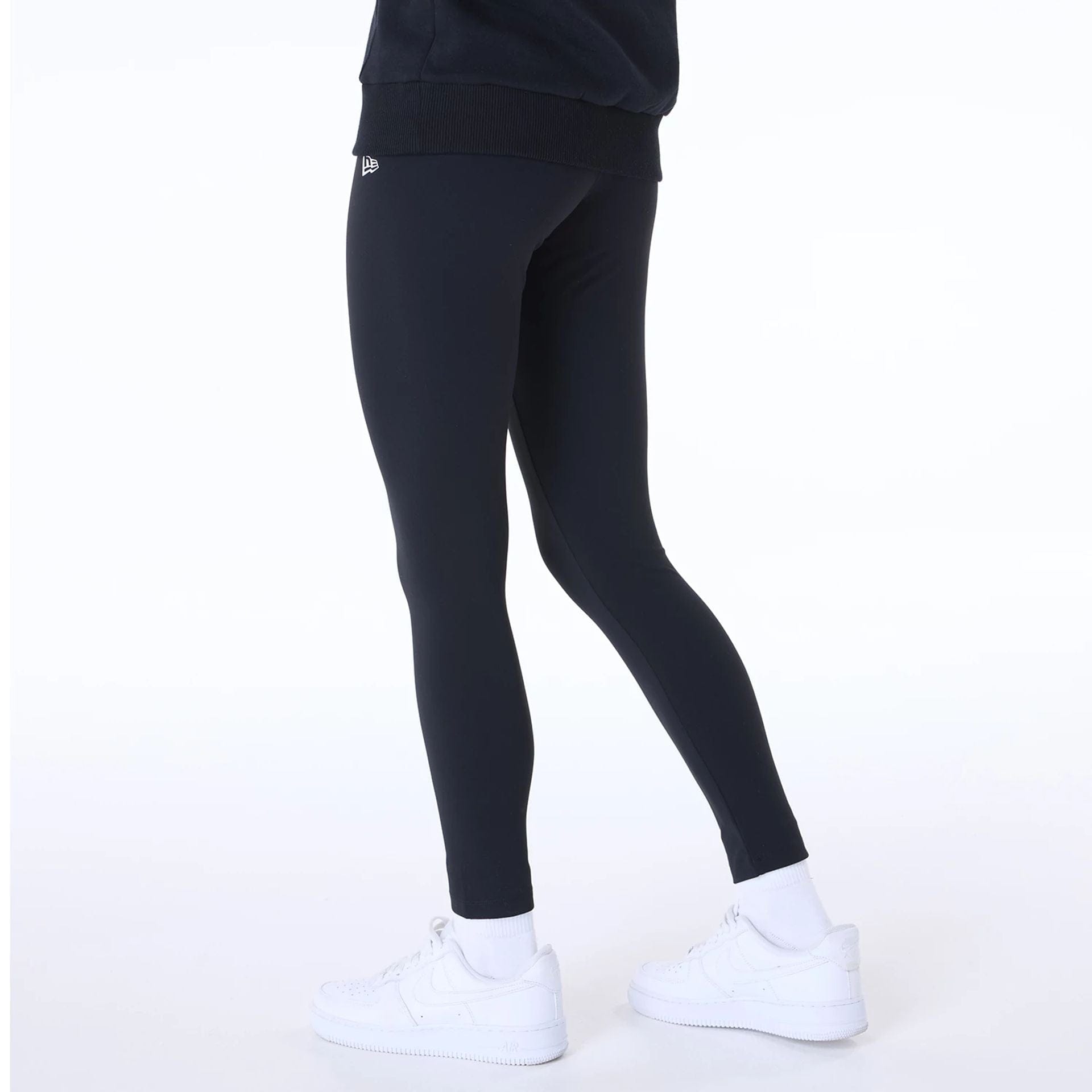 The Female model is wearing New York Yankees Womens MLB League Essential Black Leggings 4