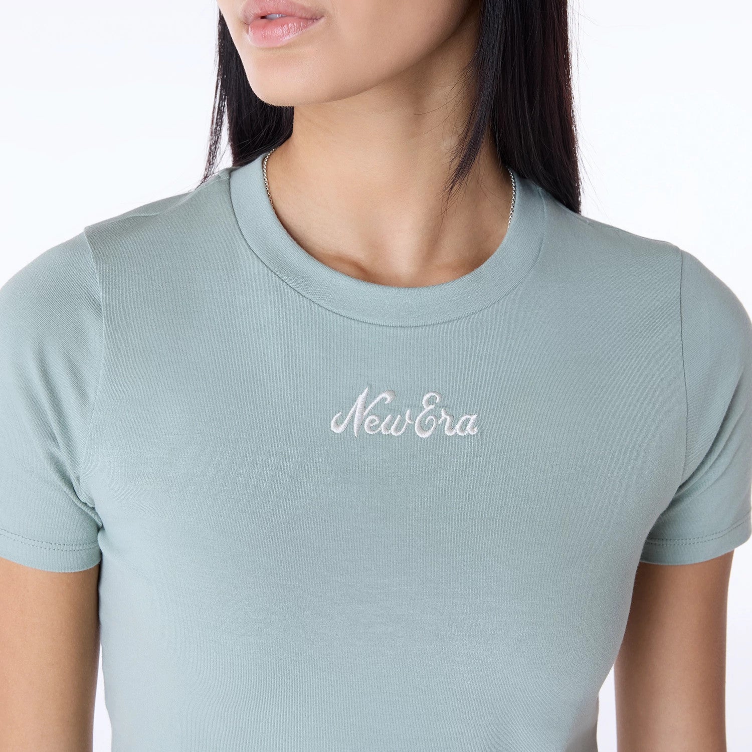 The Female model is wearing Womens New Era Slim Pastel Blue T-Shirt 3