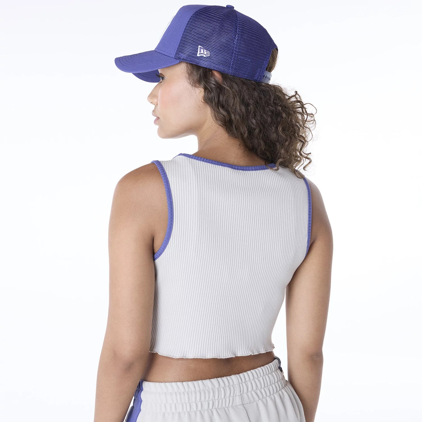 The Female model is wearing New York Yankees Womens MLB Floral Light Beige Vest 2