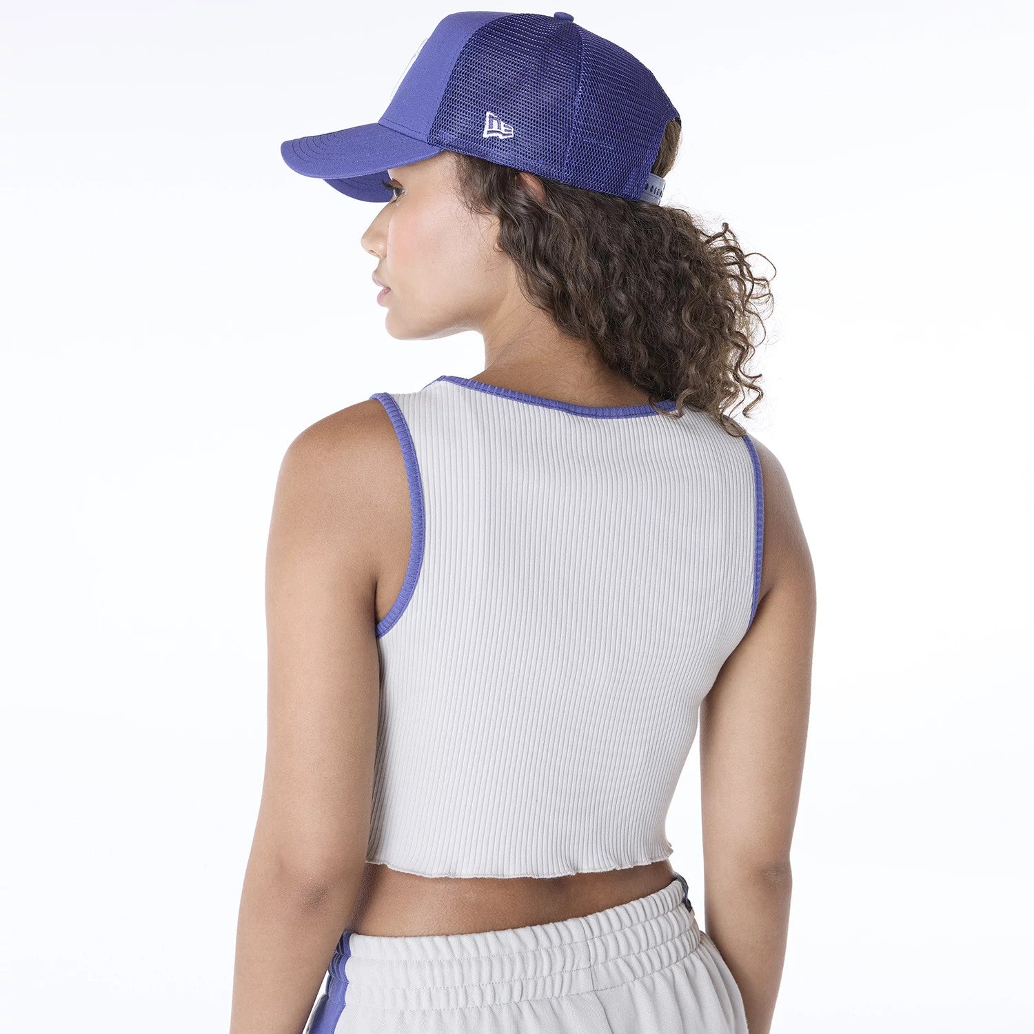 The Female model is wearing New York Yankees Womens MLB Floral Light Beige Vest 2