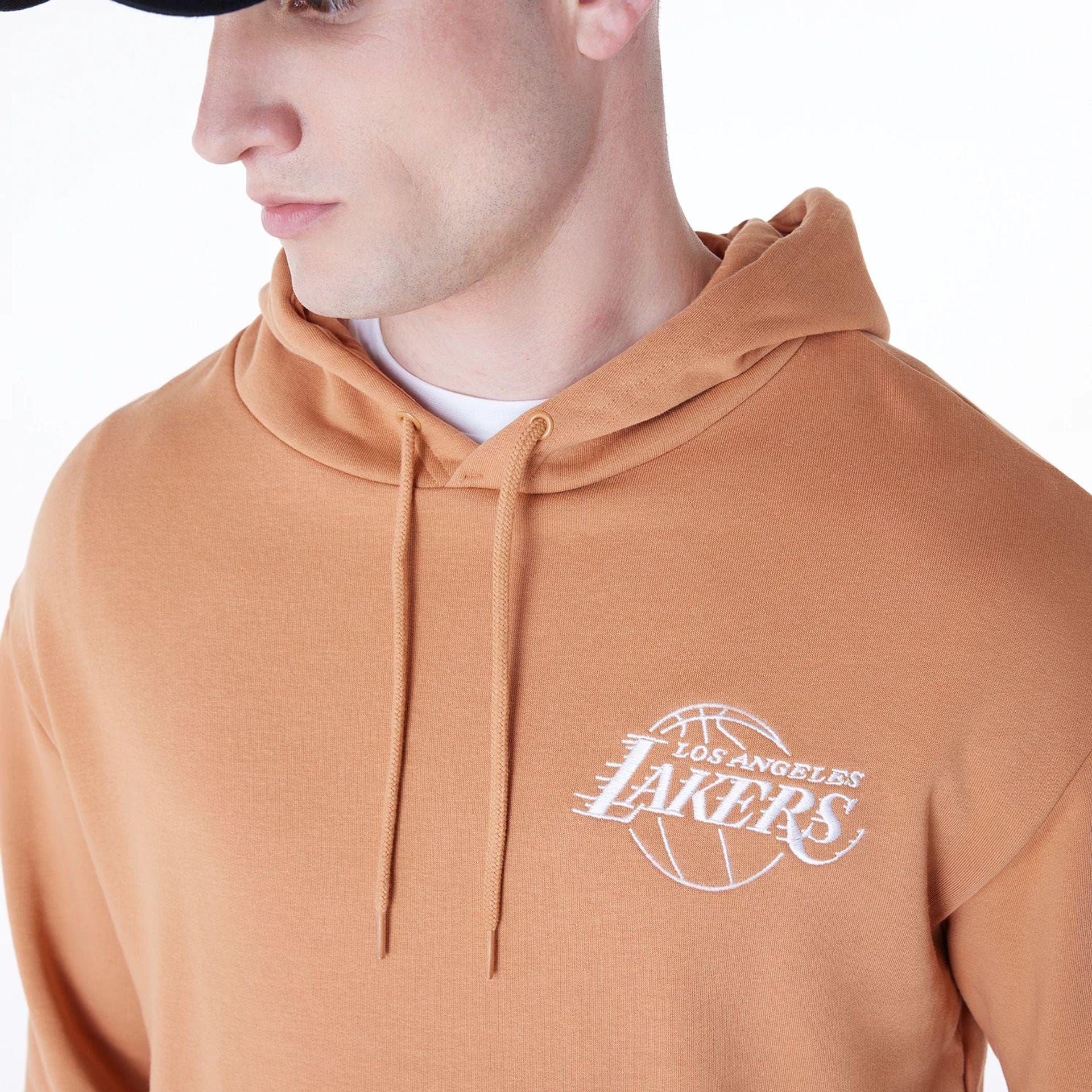 The Male model is wearing LA Lakers NBA League Essential Dark Beige Oversized Pullover Hoodie 3
