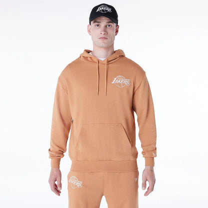 The Male model is wearing LA Lakers NBA League Essential Dark Beige Oversized Pullover Hoodie 1