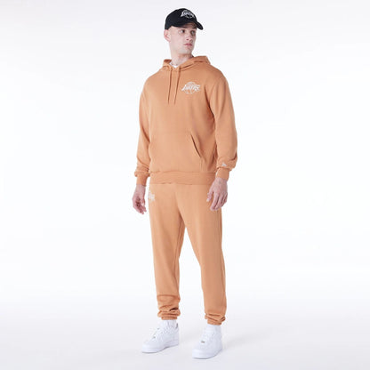 The Male model is wearing LA Lakers NBA League Essential Dark Beige Oversized Pullover Hoodie 7