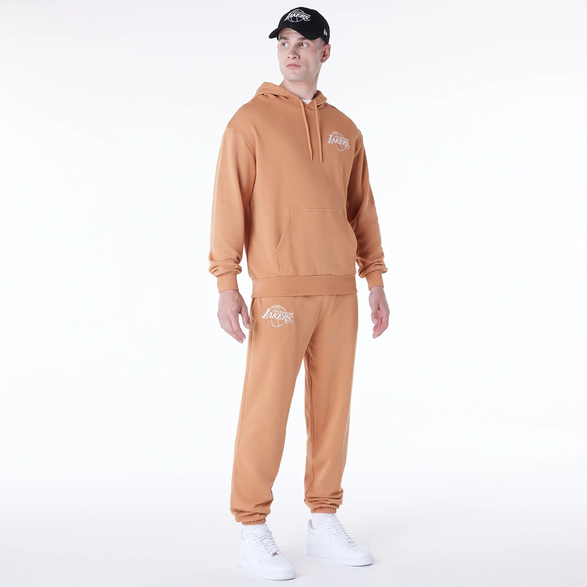 The Male model is wearing LA Lakers NBA League Essential Dark Beige Fleece Joggers 3