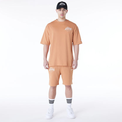 The Male model is wearing LA Lakers NBA League Essential Dark Beige Shorts 3