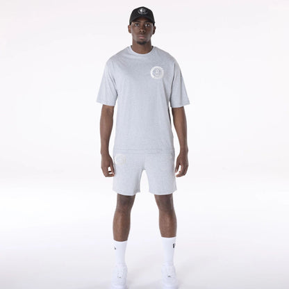 The Male model is wearing Brooklyn Nets NBA League Essential Grey Shorts 8