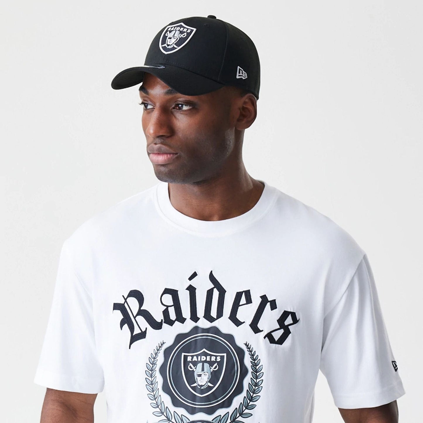 The Male model is wearing Las Vegas Raiders Throwback Prep White T-Shirt 4