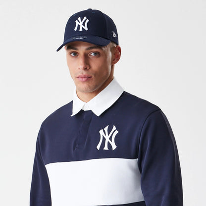 The Male model is wearing New York Yankees Throwback Prep Navy Long Sleeve Rugby Shirt 3