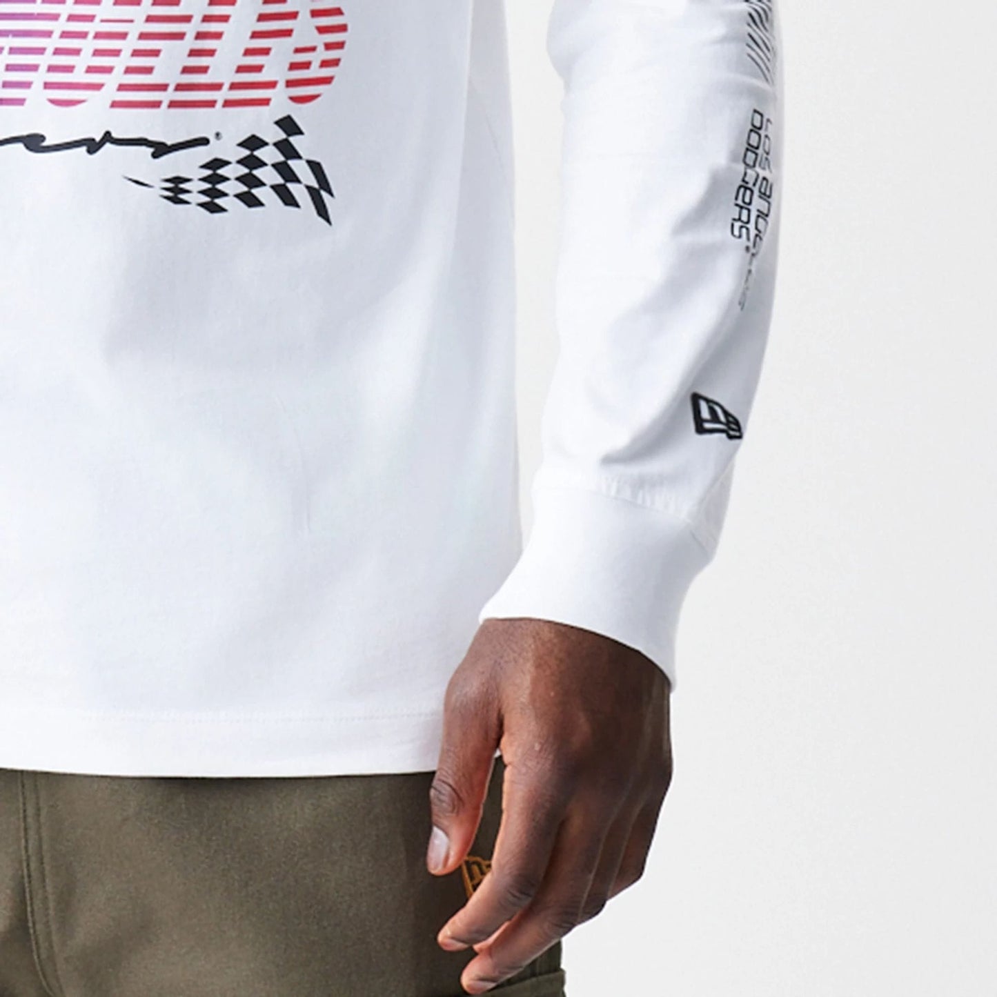 The Male model is wearing LA Dodgers Modern Driver White Long Sleeve T-Shirt 4
