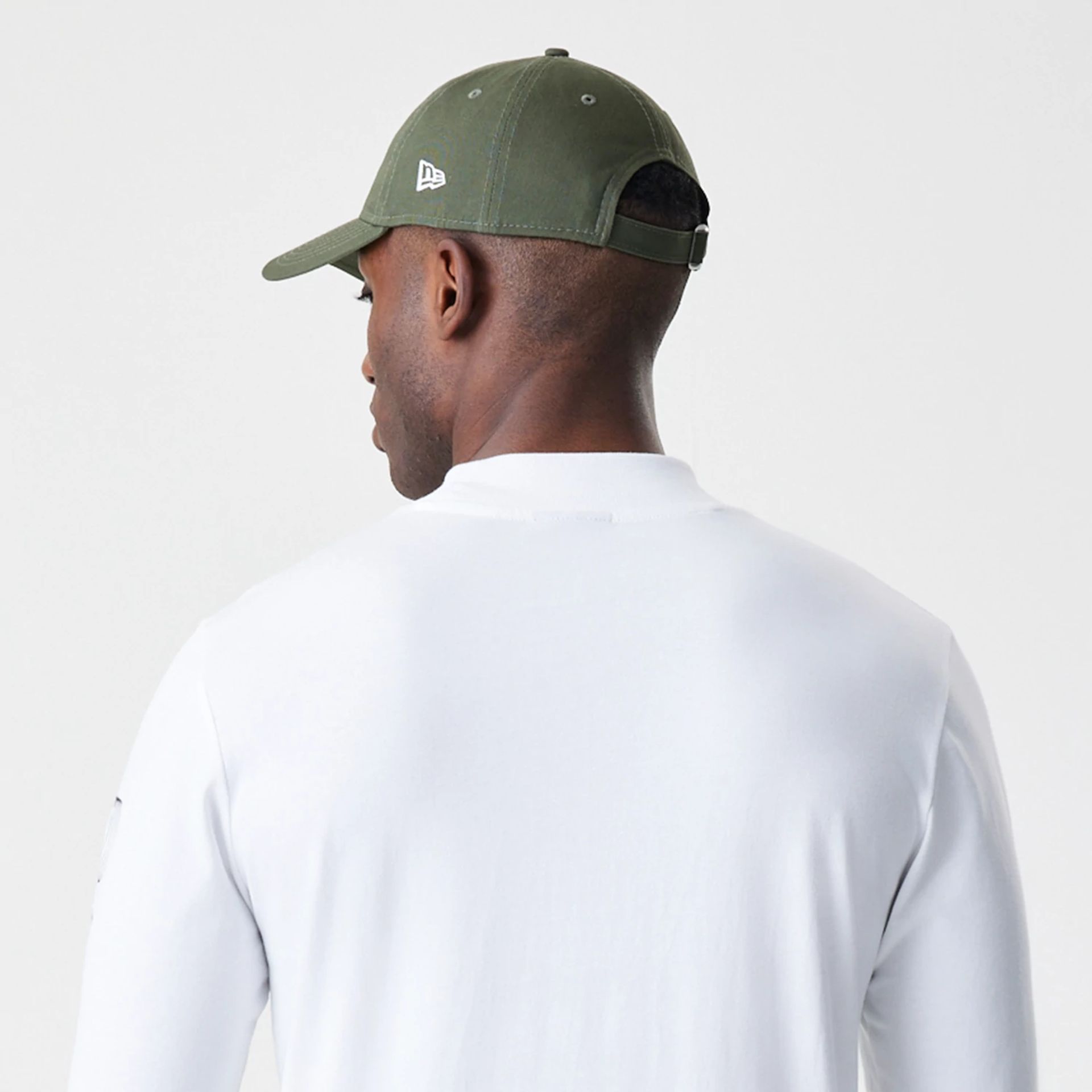 The Male model is wearing LA Dodgers Modern Driver White Long Sleeve T-Shirt 5