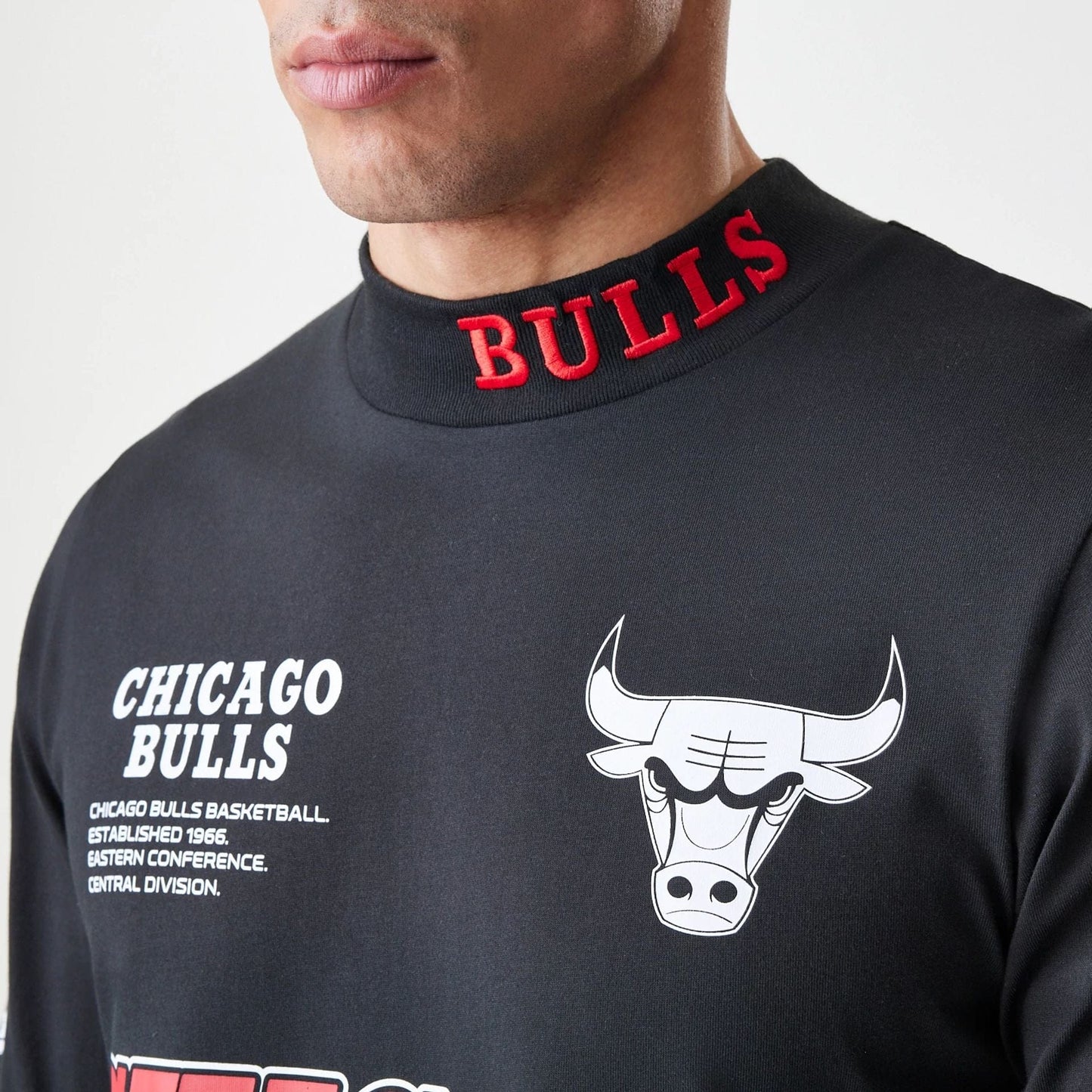 The Male model is wearing Chicago Bulls Modern Driver Black Long Sleeve T-Shirt 2