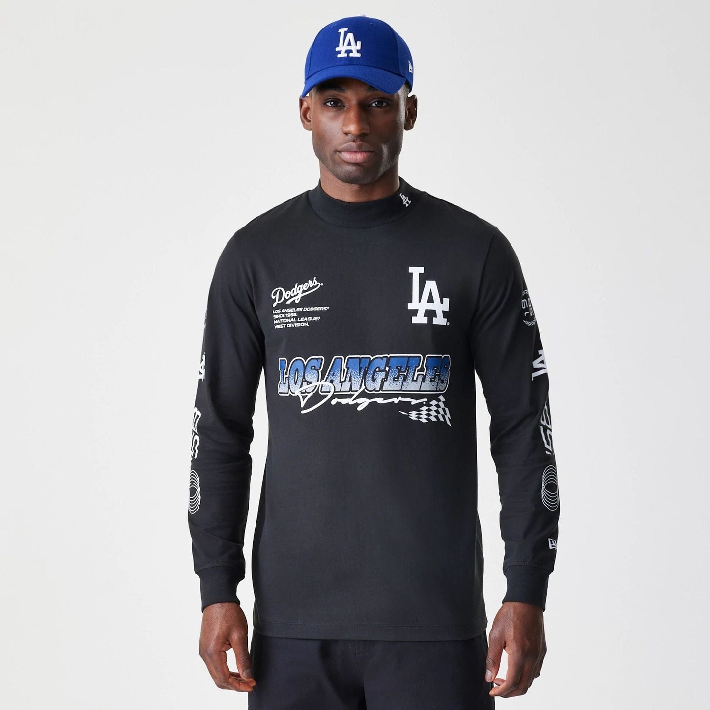 The Male model is wearing LA Dodgers Modern Driver Black Long Sleeve T-Shirt 1