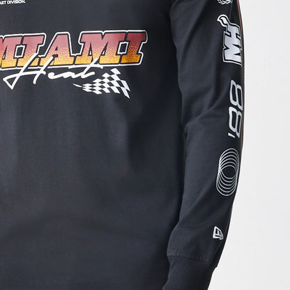 The Male model is wearing Miami Heat Modern Driver Black Long Sleeve T-Shirt 4