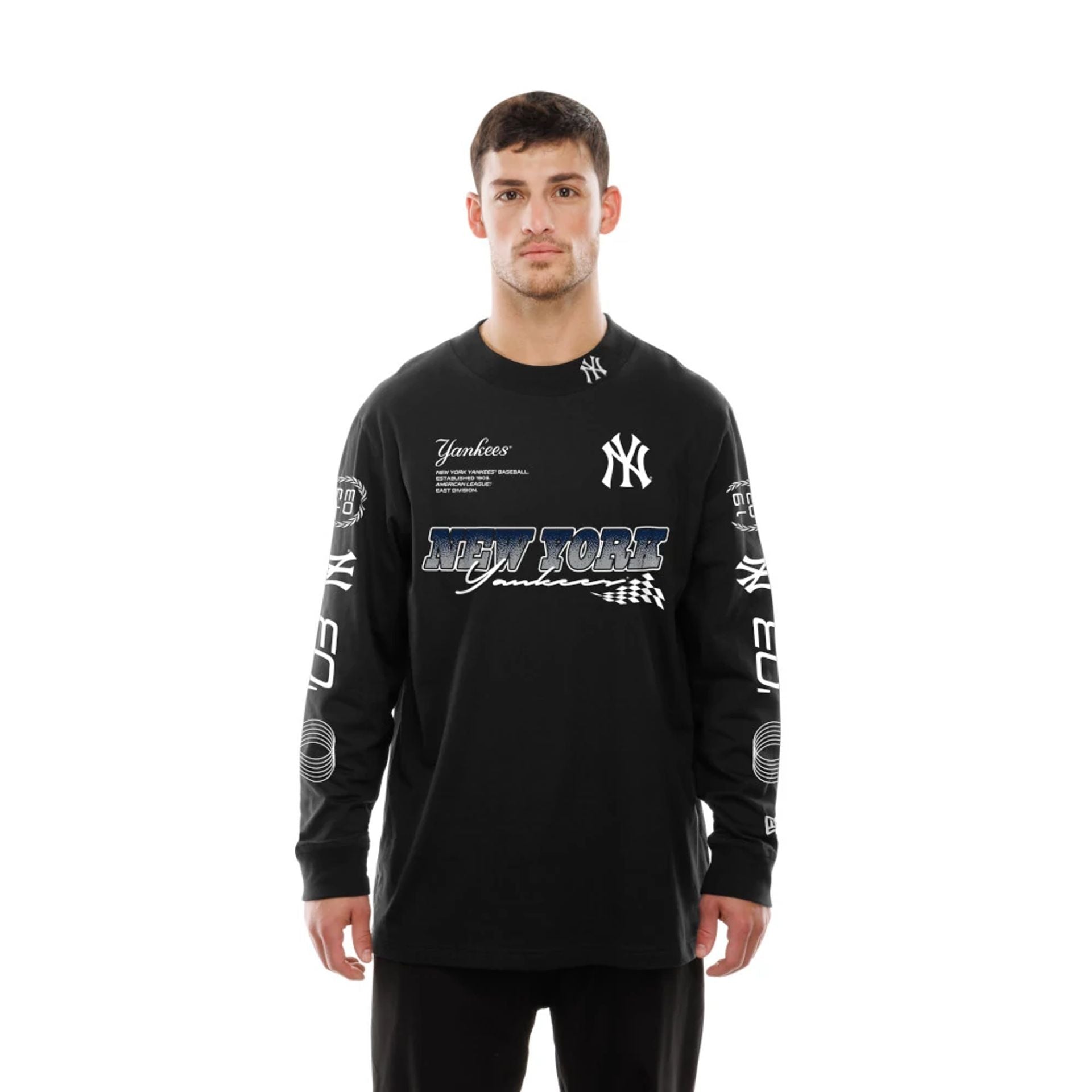 The Male model is wearing New York Yankees Modern Driver Black Long Sleeve T-Shirt 6