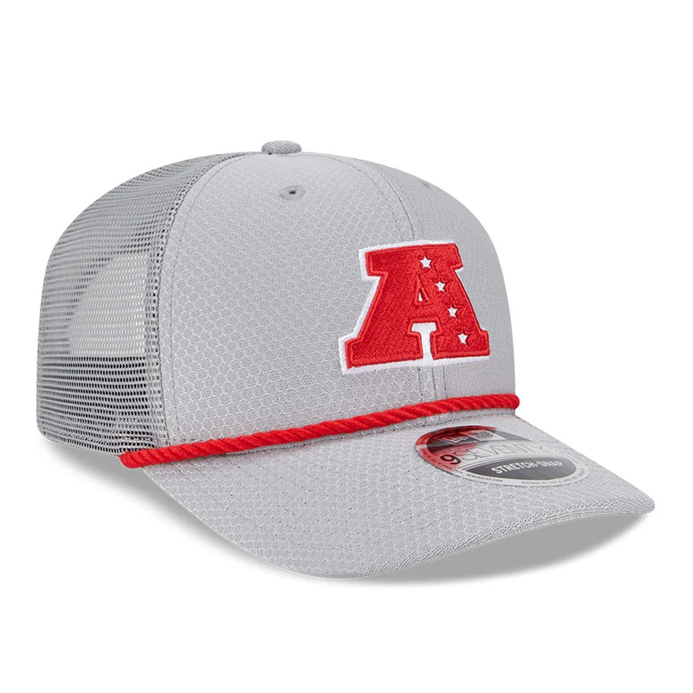 NFL Pro Bowl 2025 AFC Logo Grey New Era 9SEVENTY Trucker Stretch Snap Cap, three-quarter view with a red embroidered A logo on the front panel, a red cord across the grey visor, and a 9SEVENTY size sticker on the visor.