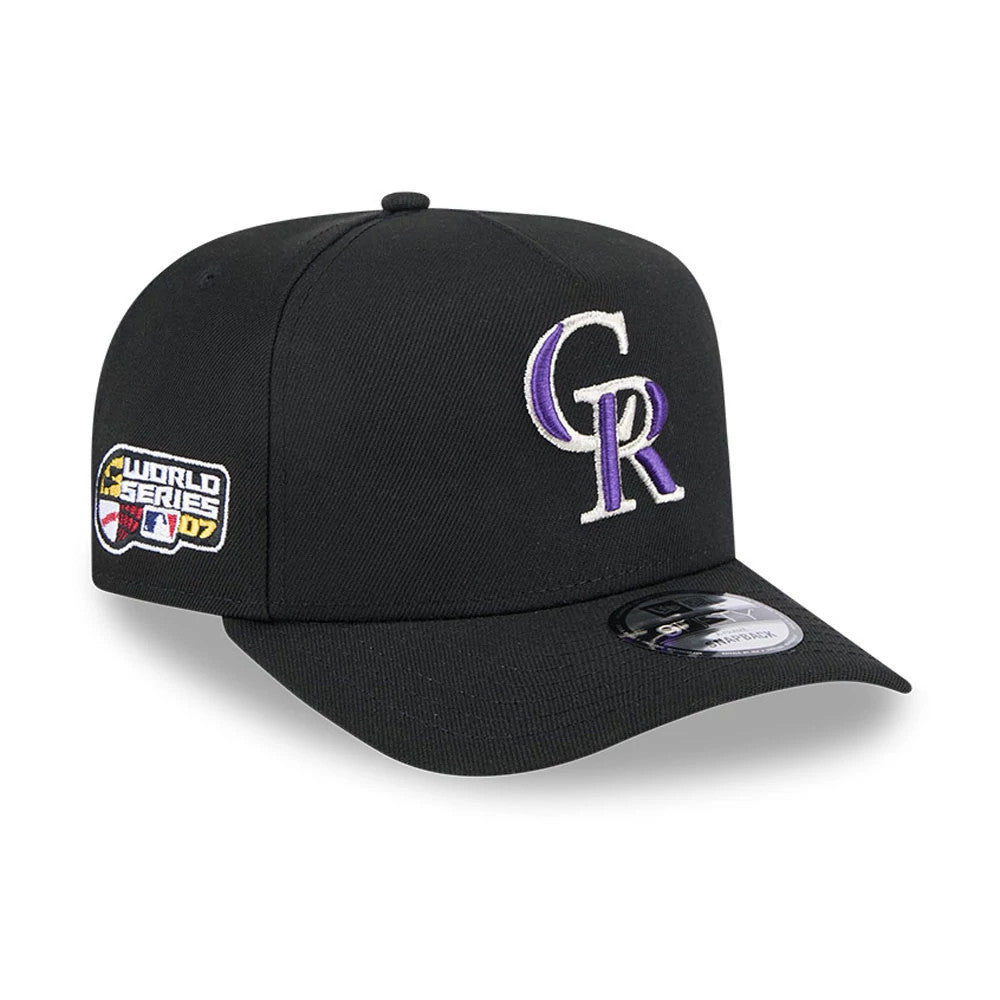 Colorado Rockies MLB Evergreen Black New Era 9FIFTY A-Frame Snapback Adjustable Cap, three-quarter view showing raised white and purple CR logo on the front panel, with a World Series 07 patch on the side and a 9FIFTY size sticker on the black visor.