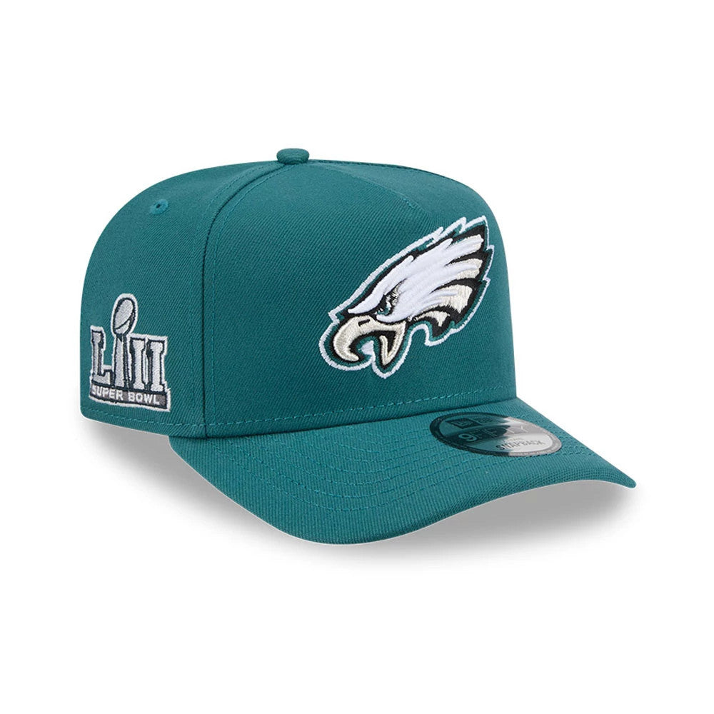Eagles NFL Evergreen Dark Green New Era 9FIFTY A-Frame Snapback Adjustable Cap, front view showing the raised embroidered eagle head logo on the front panel, Super Bowl LII patch on the left side, and 9FIFTY size sticker on the flat visor.