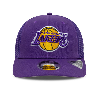 LA Lakers NBA Evergreen Purple New Era 9SEVENTY Stretch Snap Adjustable Cap, front view with raised embroidered Lakers logo on the purple front panel, purple mesh sides, and a 9SEVENTY size sticker on the curved visor.