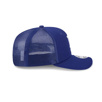 LA Dodgers MLB Evergreen Dark Blue New Era 9SEVENTY Stretch Snap Adjustable Cap, side view showing the mesh back panels and blue visor with a 9SEVENTY size sticker, featuring a rounded crown.