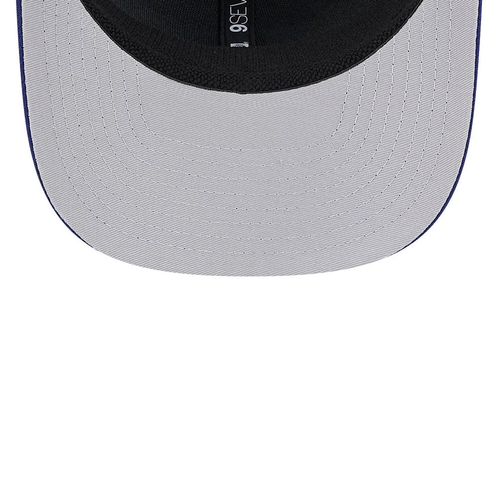 LA Dodgers MLB Evergreen Dark Blue New Era 9SEVENTY Stretch Snap Adjustable Cap, inside view showing the grey undervisor and black sweatband with internal taping featuring the 9SEVENTY label in white.